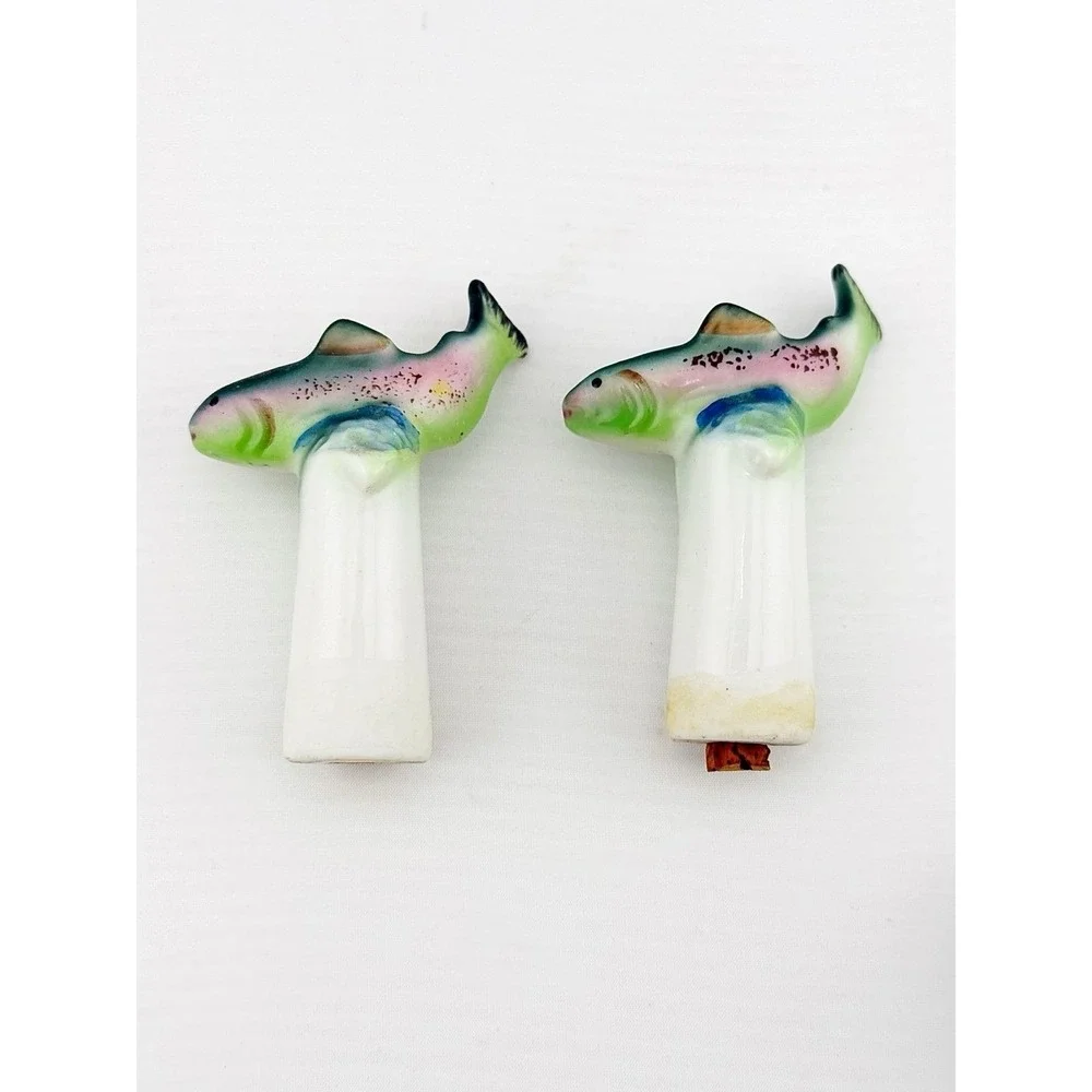 Vintage Japanese 1950's fish nodder salt & pepper shakers. Base shows fishing